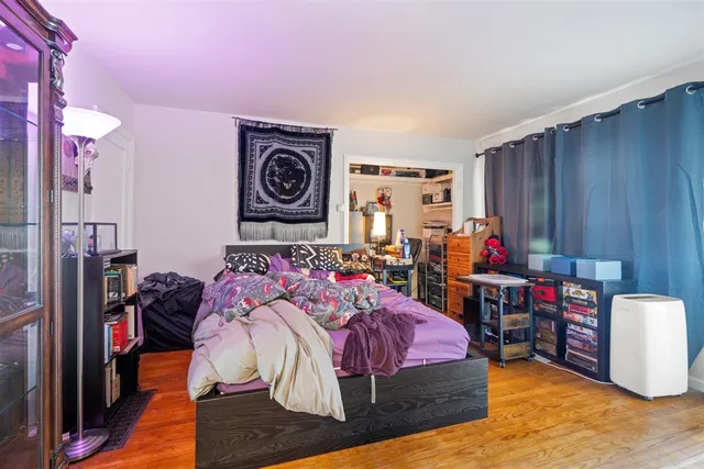 a kitchen with granite countertop a sink stainless steel appliances and cabinets