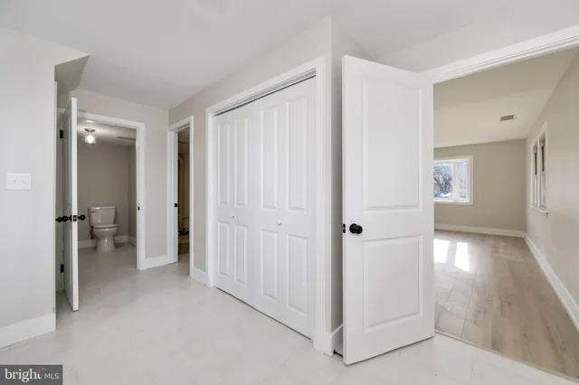 a view of a room with a wardrobe space