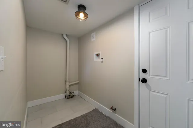 a view of a room with rack on the wall