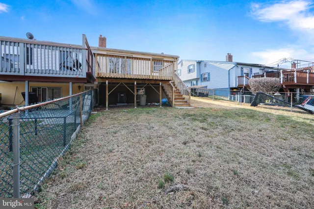 a view of a house with a balcony and stairs