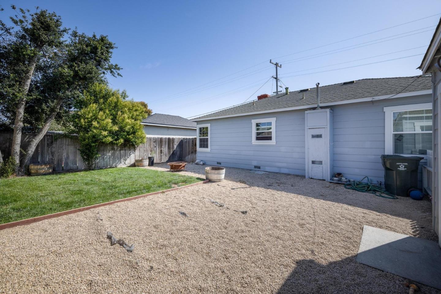17 North 3rd Street Salinas, CA 93906 - Photo 13 of 13 a front view of a house with a yard and garage