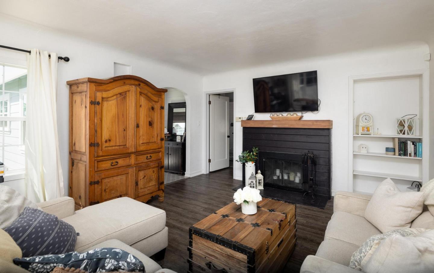 17 North 3rd Street Salinas, CA 93906 - Photo 4 of 13 a living room with furniture fireplace and flat screen tv
