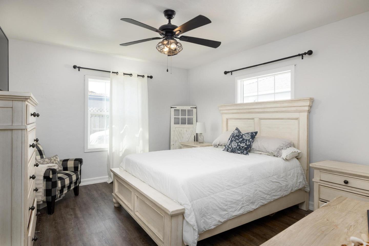 17 North 3rd Street Salinas, CA 93906 - Photo 9 of 13 a bedroom with a bed and a table in it