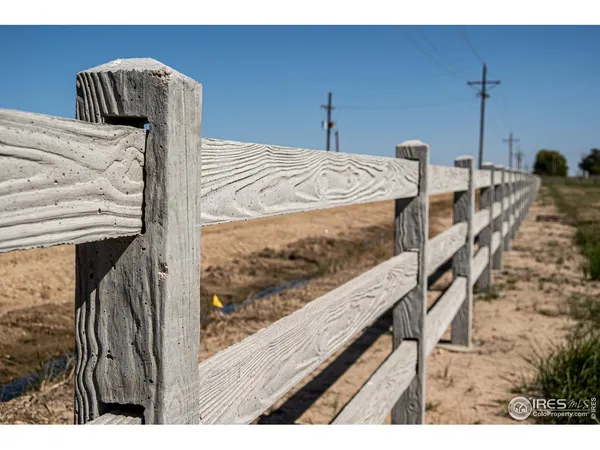 a view of a bedroom with furniture
