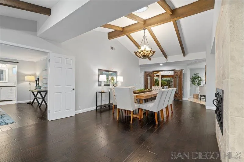 12720 Pedriza Road Poway, CA 92064 - Photo 12 of 26 a dining room with furniture and wooden floor