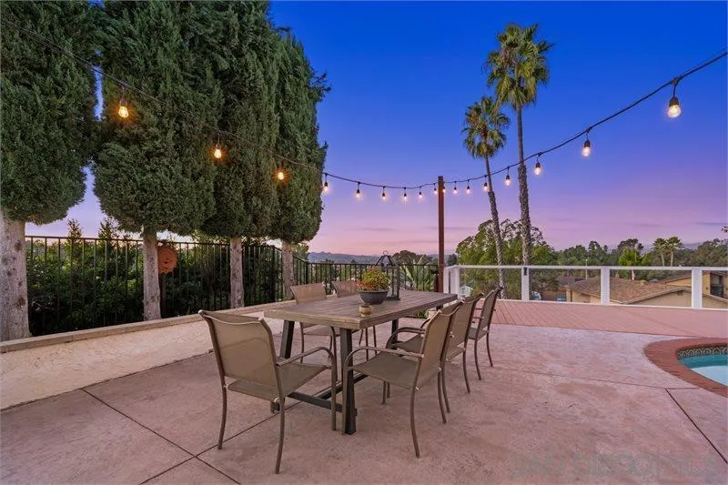 12720 Pedriza Road Poway, CA 92064 - Photo 4 of 26 a view of a patio with a table and chairs