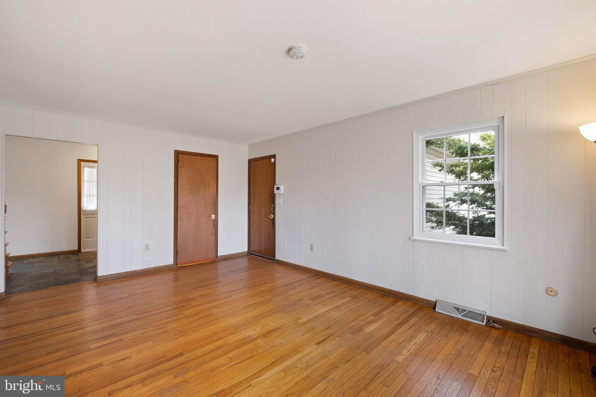 2508 Cinder Road Wilmington, DE 19810 - Photo 4 of 34 Family Room - Doors to Half Bath & Garage