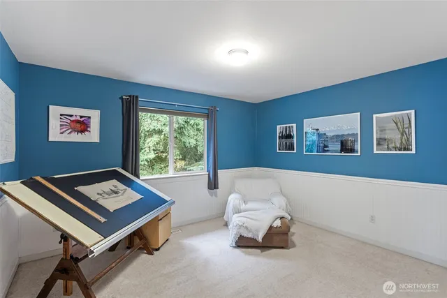 a bathroom with a granite countertop sink toilet a large mirror a shower and a bathtub
