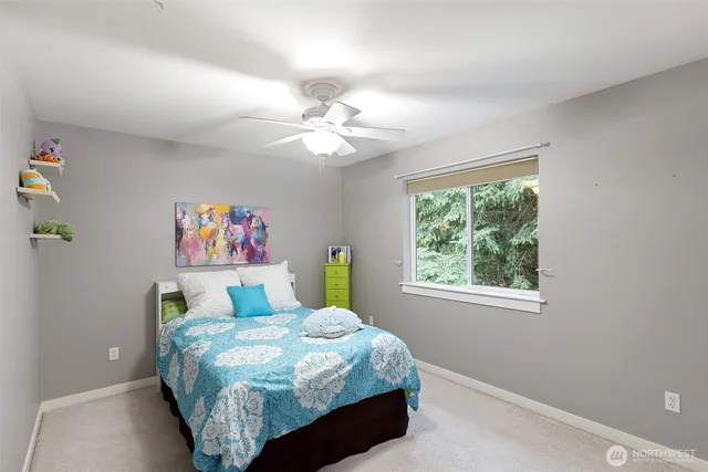 a view of a chairs and table in the balcony