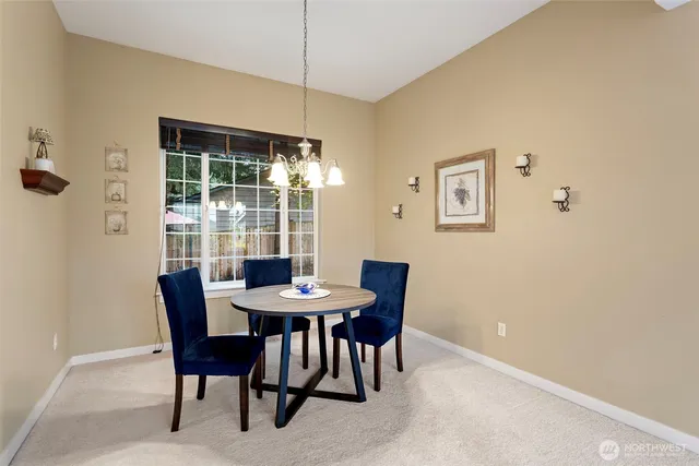 a view of livingroom with furniture and windows