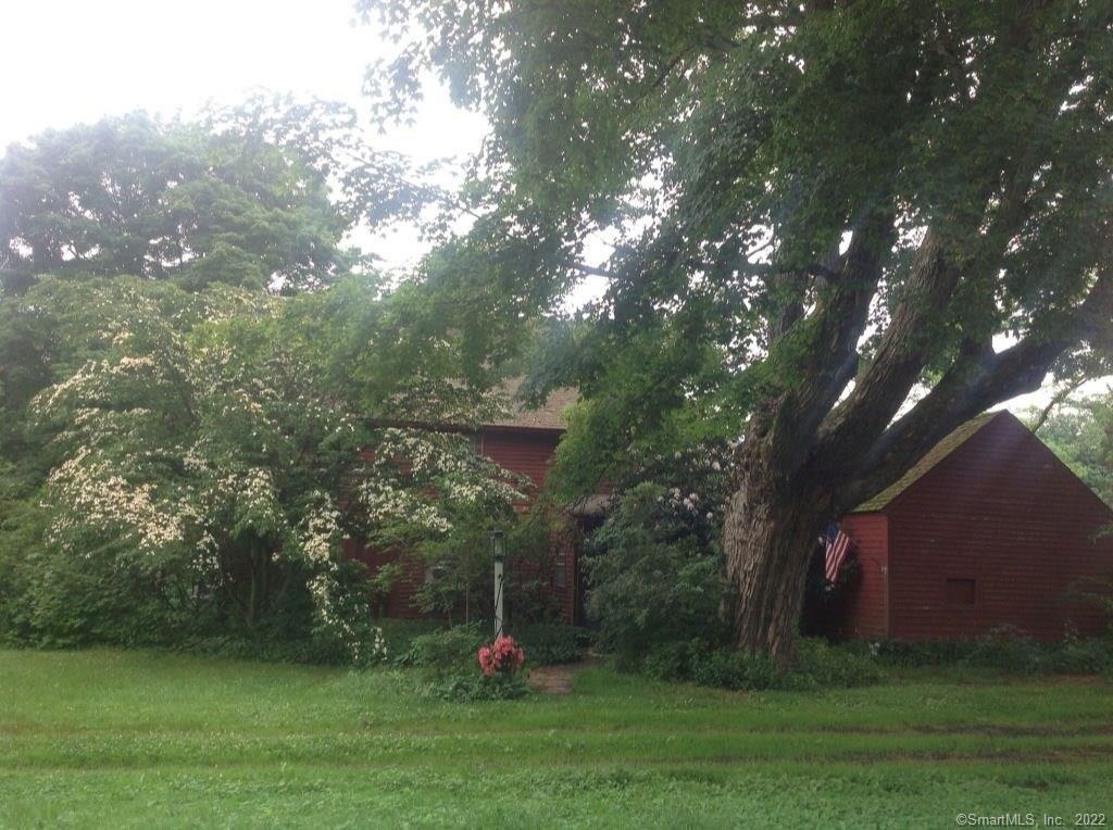 113 Laurel Brook Road Middlefield, CT 06455 - Photo 1 of 1 a view of a golf course with a tree