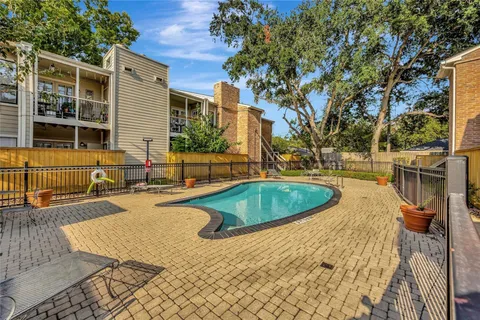 swimming pool with outdoor seating