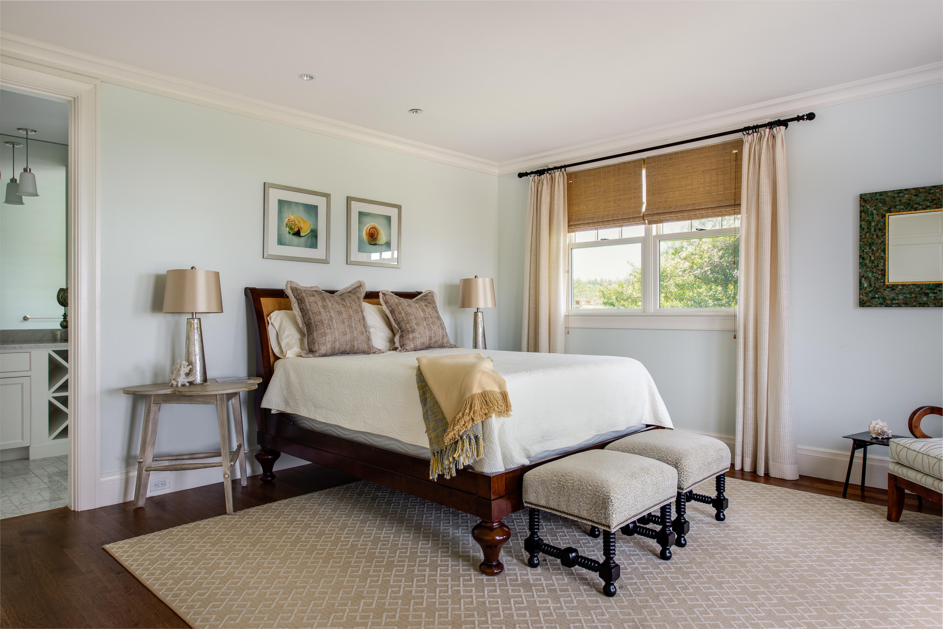 85 Salten Point Road Barnstable, MA 02630 - Photo 19 of 34 a bedroom with a bed and a chair with the wooden floor
