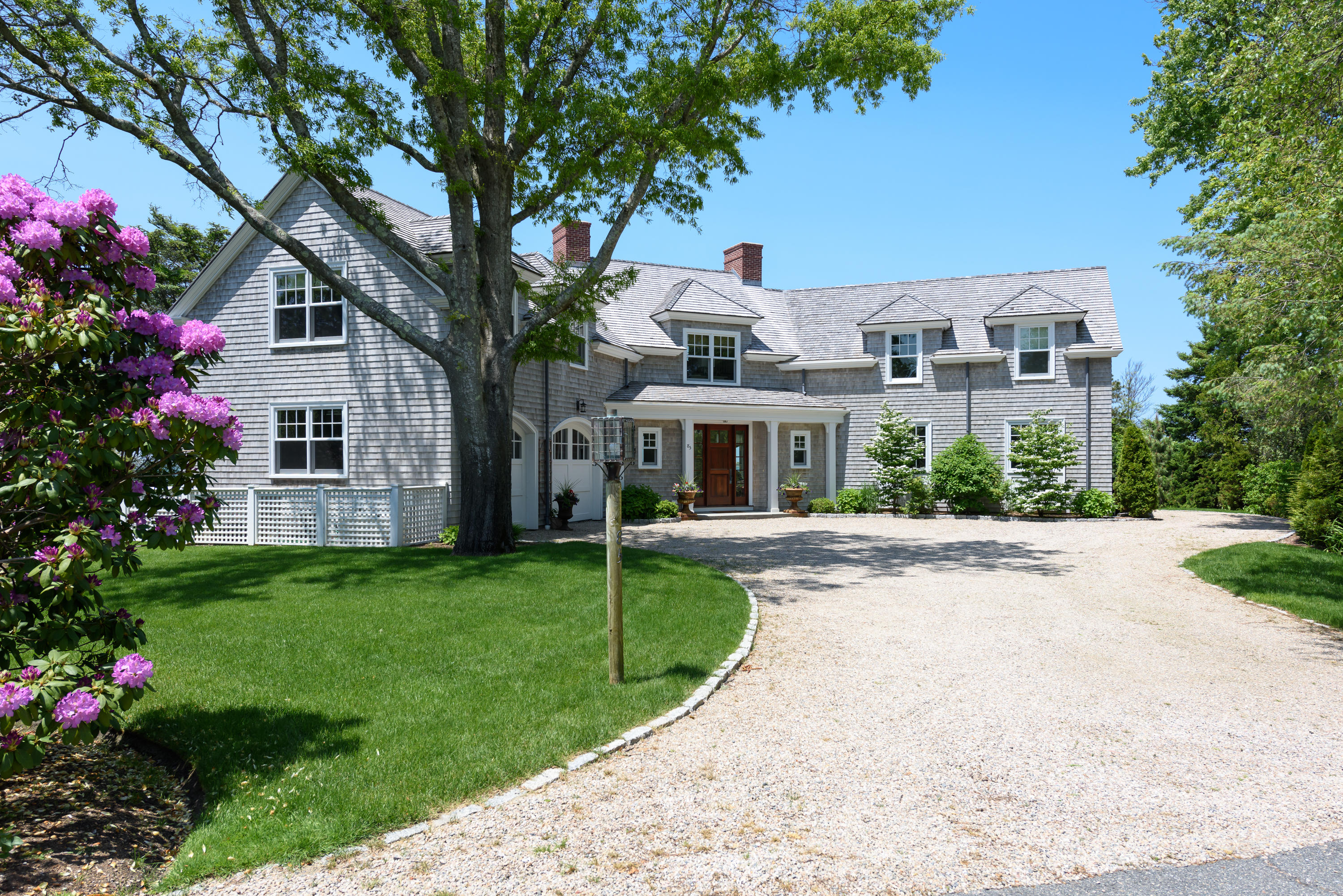 85 Salten Point Road Barnstable, MA 02630 - Photo 3 of 34 a front view of a house with a yard