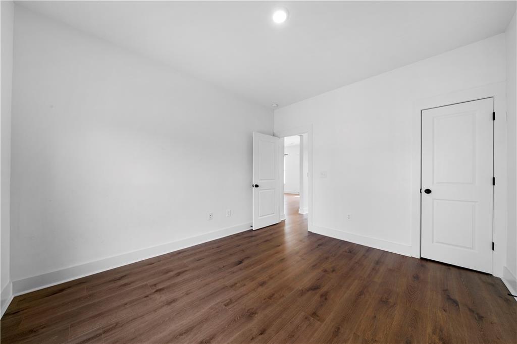 19 Trotters Lane Rome, GA 30165 - Photo 27 of 44 a view of an empty room with wooden floor
