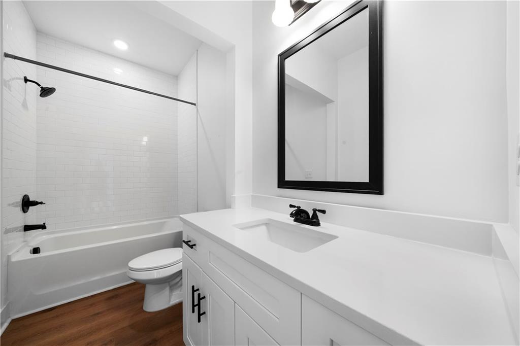 19 Trotters Lane Rome, GA 30165 - Photo 28 of 44 a bathroom with a sink a toilet and shower