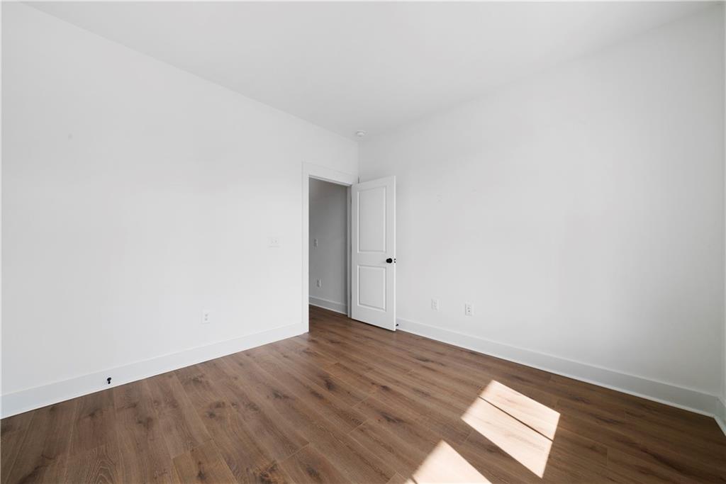 19 Trotters Lane Rome, GA 30165 - Photo 30 of 44 an empty room with wooden floor