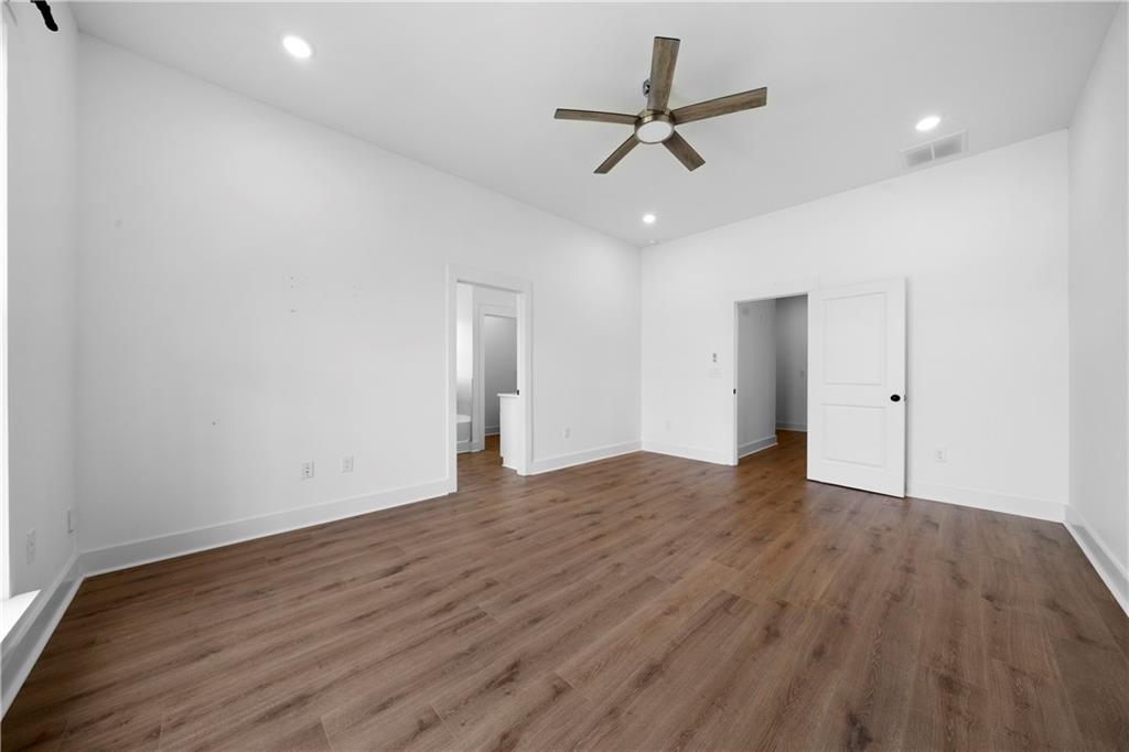 19 Trotters Lane Rome, GA 30165 - Photo 33 of 44 wooden floor in an empty room with a window