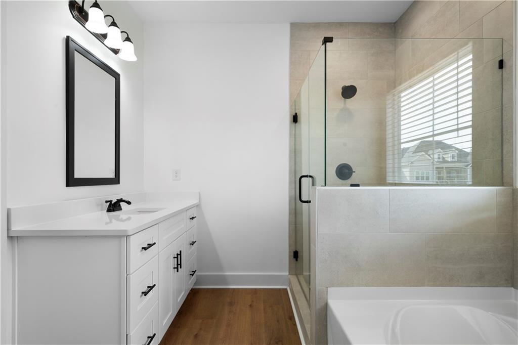 19 Trotters Lane Rome, GA 30165 - Photo 35 of 44 a bathroom with a sink a toilet and shower