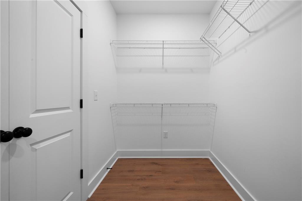 19 Trotters Lane Rome, GA 30165 - Photo 38 of 44 a view of a room with racks on the wall