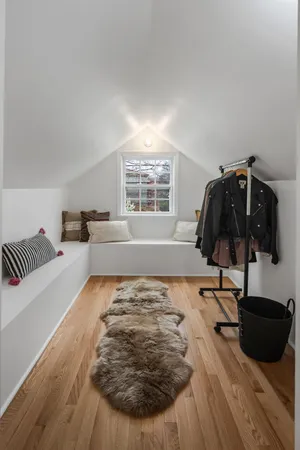 a living room with couch and a window