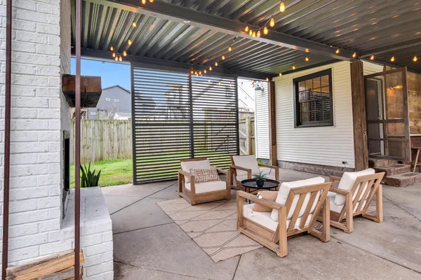 a building outdoor space with patio furniture