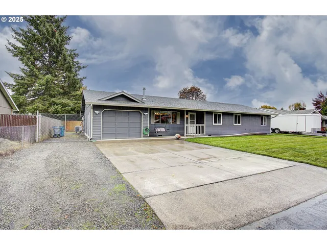a house with yard in front of it