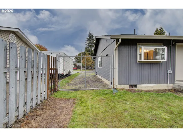 a view of a backyard with a garden