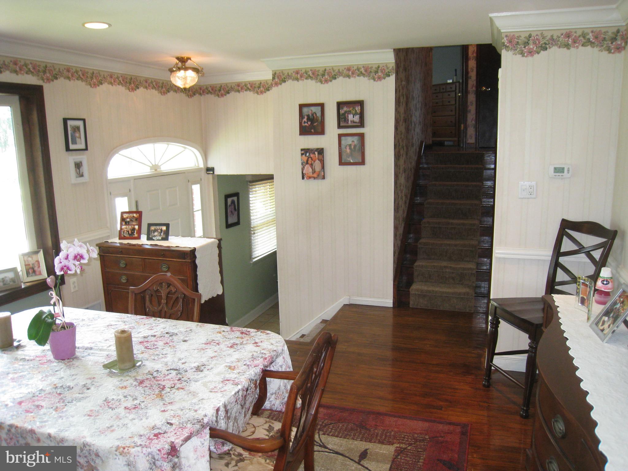 29 Buttonwood Road Stratford, NJ 08084 - Photo 28 of 45 a view of a dining room with furniture and wooden floor