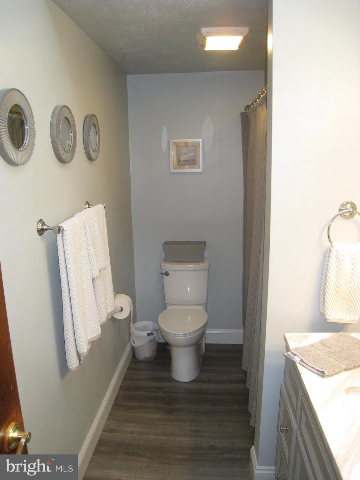 29 Buttonwood Road Stratford, NJ 08084 - Photo 40 of 45 a bathroom with a toilet a sink and a shower