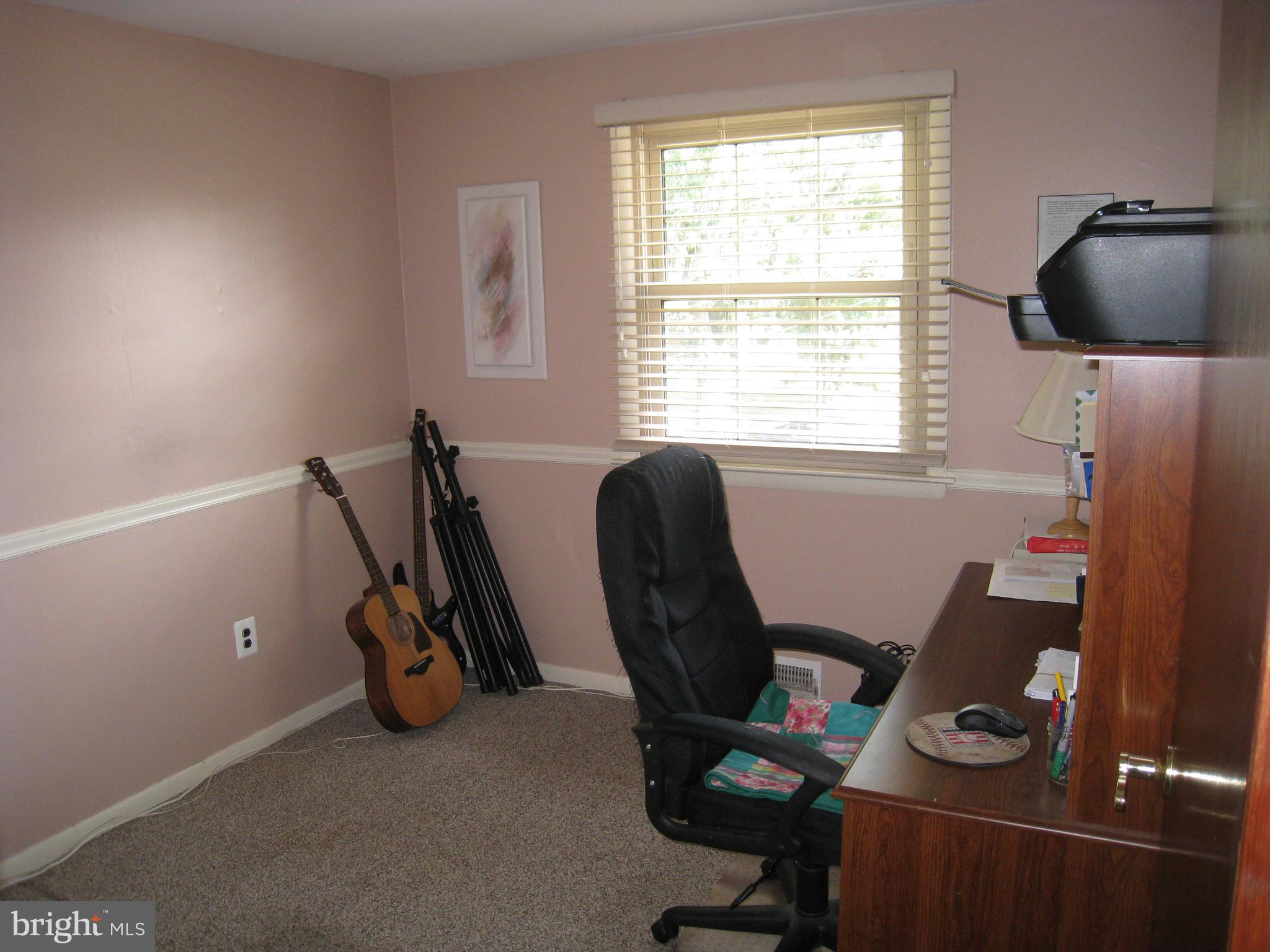 29 Buttonwood Road Stratford, NJ 08084 - Photo 42 of 45 a view of workspace with wooden floor windows gym equipment and windows