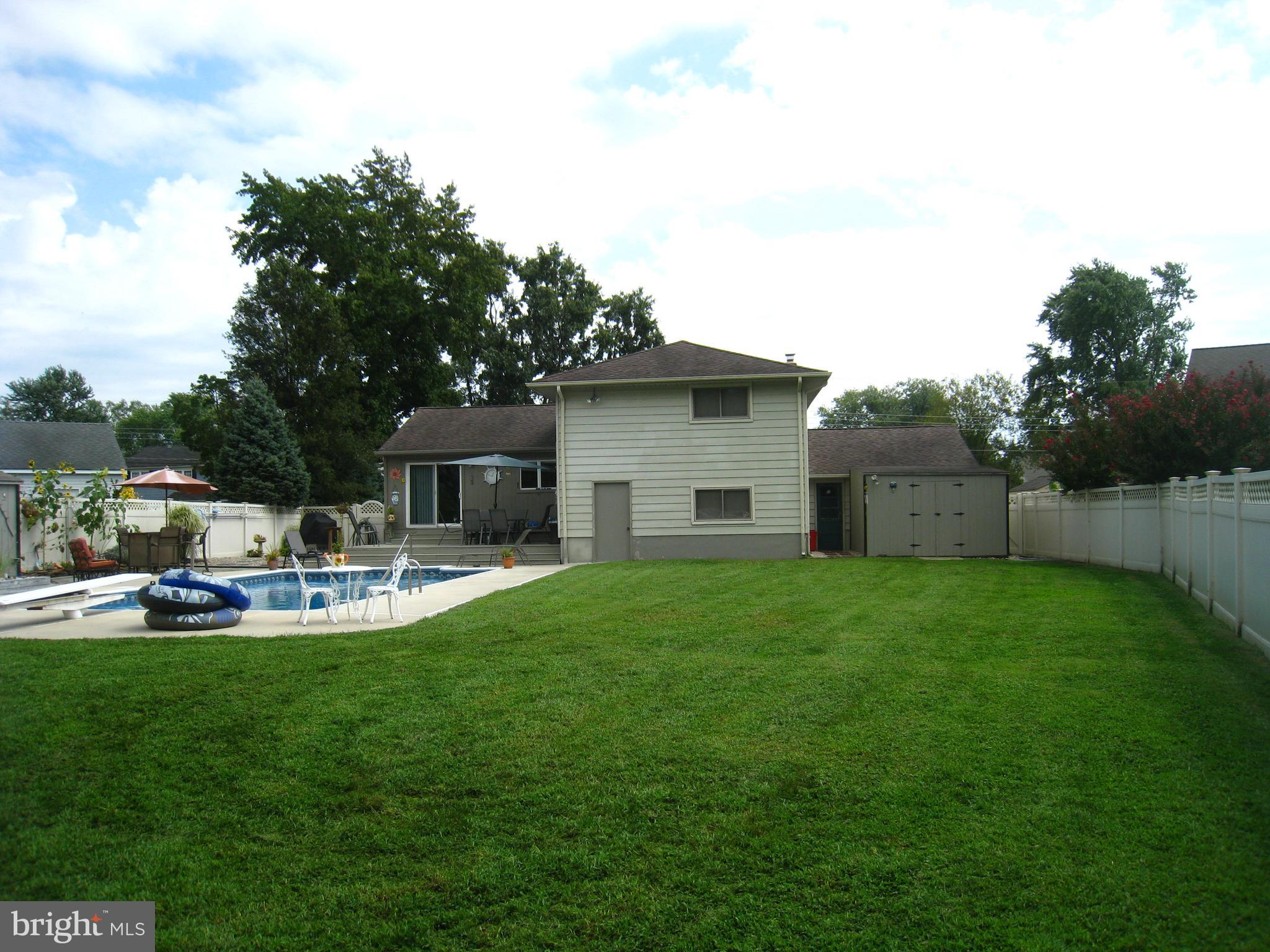 29 Buttonwood Road Stratford, NJ 08084 - Photo 9 of 45 a view of a house with backyard and sitting area