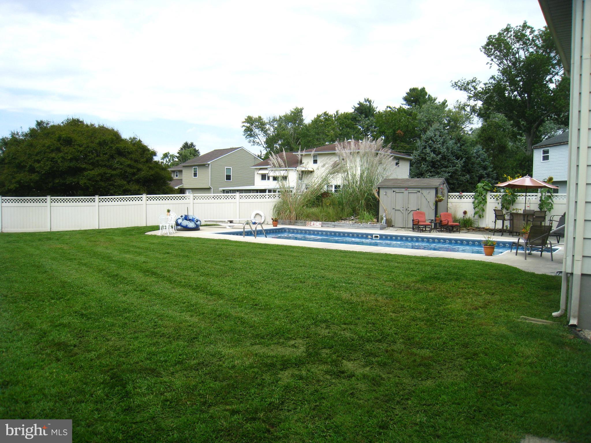 29 Buttonwood Road Stratford, NJ 08084 - Photo 10 of 45 a view of a house with a big yard