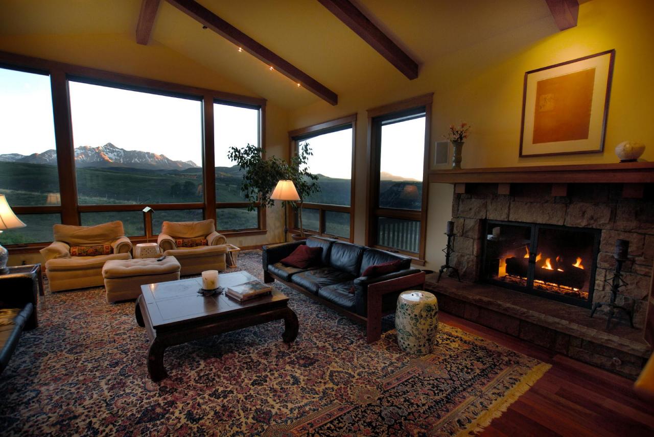 3315 Last Dollar Road Telluride, CO 81435 - Photo 2 of 12 a living room with furniture fireplace and a large window