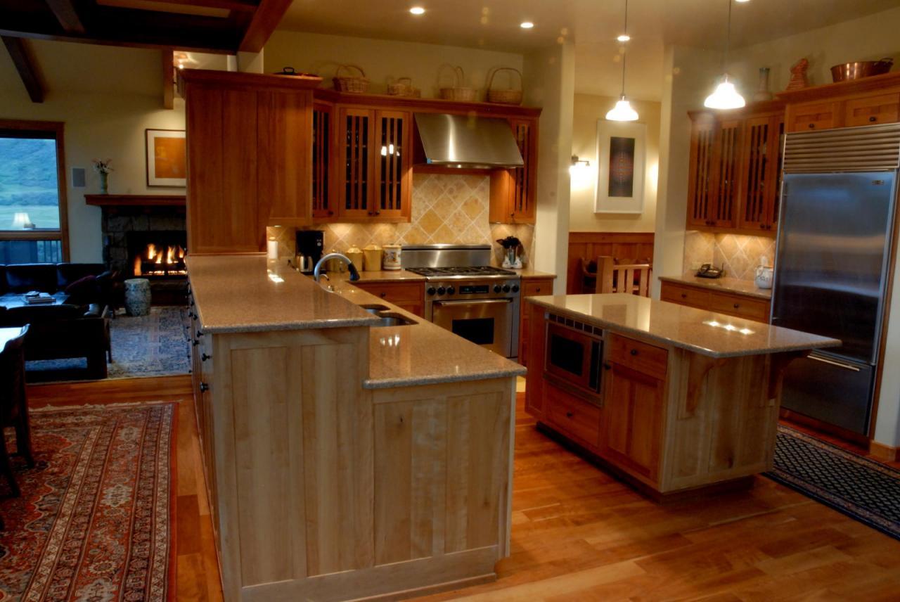 3315 Last Dollar Road Telluride, CO 81435 - Photo 3 of 12 a kitchen with wooden cabinets and a sink