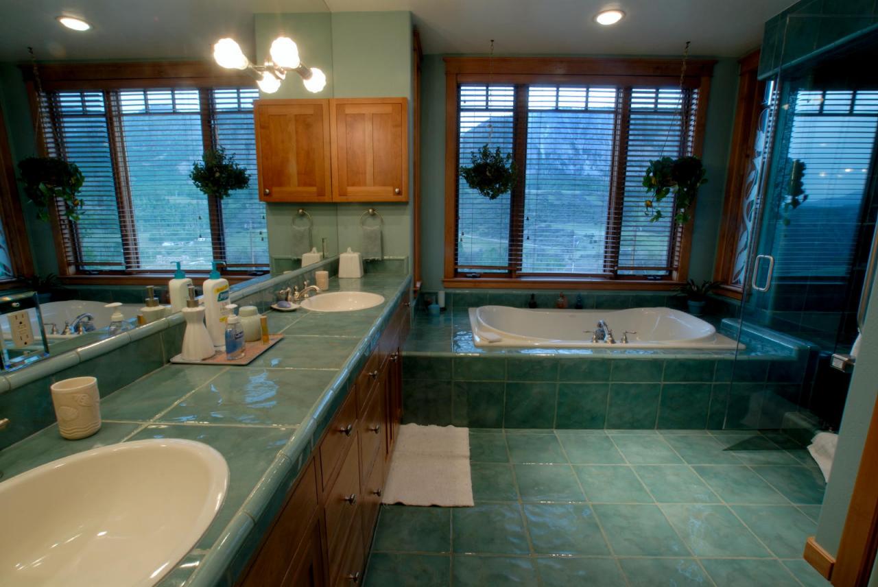 3315 Last Dollar Road Telluride, CO 81435 - Photo 7 of 12 a bathroom with sink granite and a large mirror