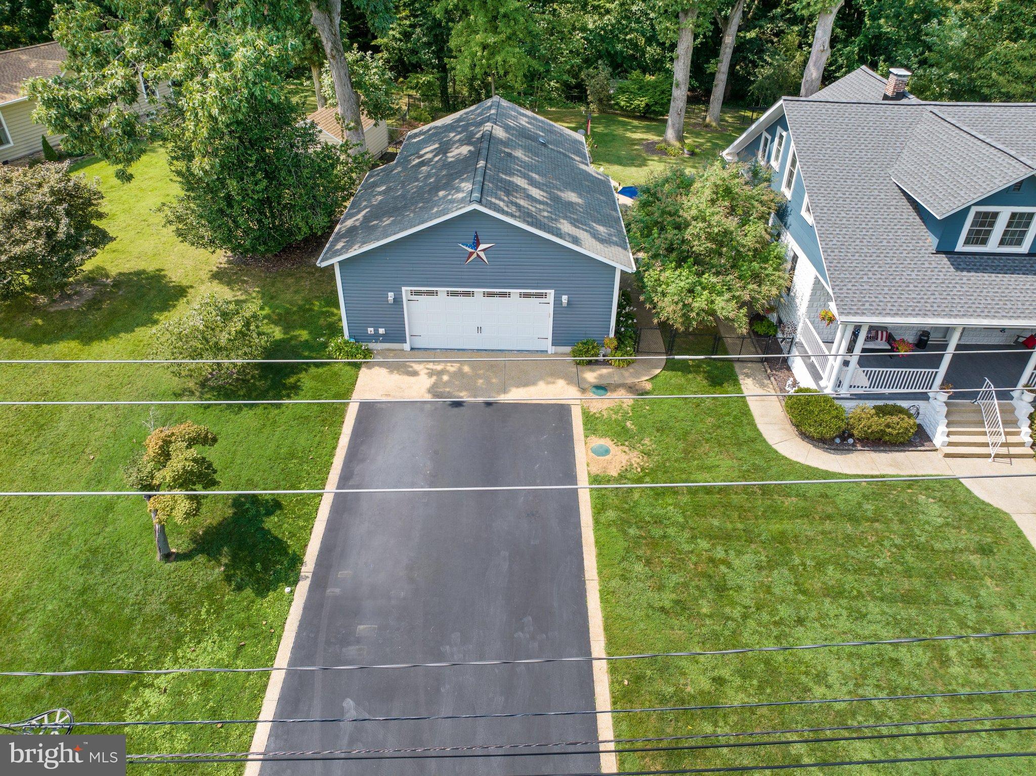 522 Old Hammonds Ferry Road Linthicum Heights, MD 21090 - Photo 63 of 109 Charming home with lush greenery and garage.