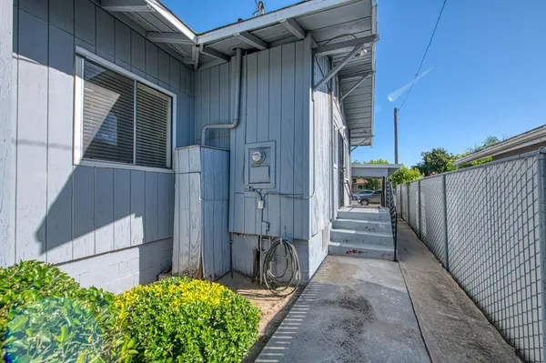 a view of entryway with stairs and wooden floor