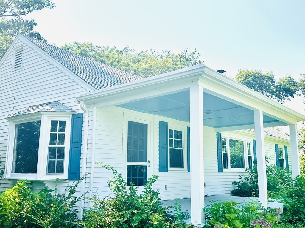 460 Williston Road Bourne, MA 02562 - Photo 1 of 37 front view of a house with a porch