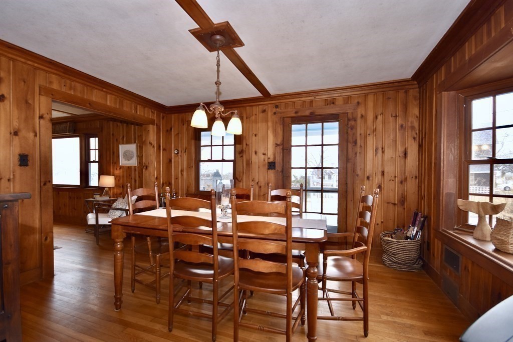 460 Williston Road Bourne, MA 02562 - Photo 11 of 37 a view of a dining room with furniture and wooden floor