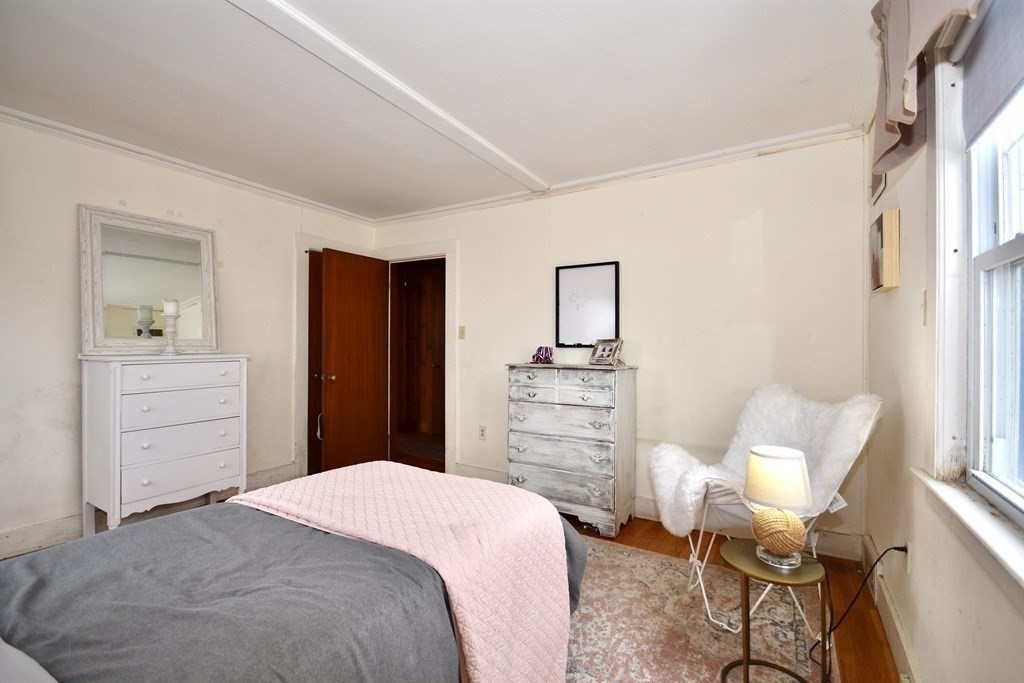 460 Williston Road Bourne, MA 02562 - Photo 19 of 37 a bedroom with a bed and furniture