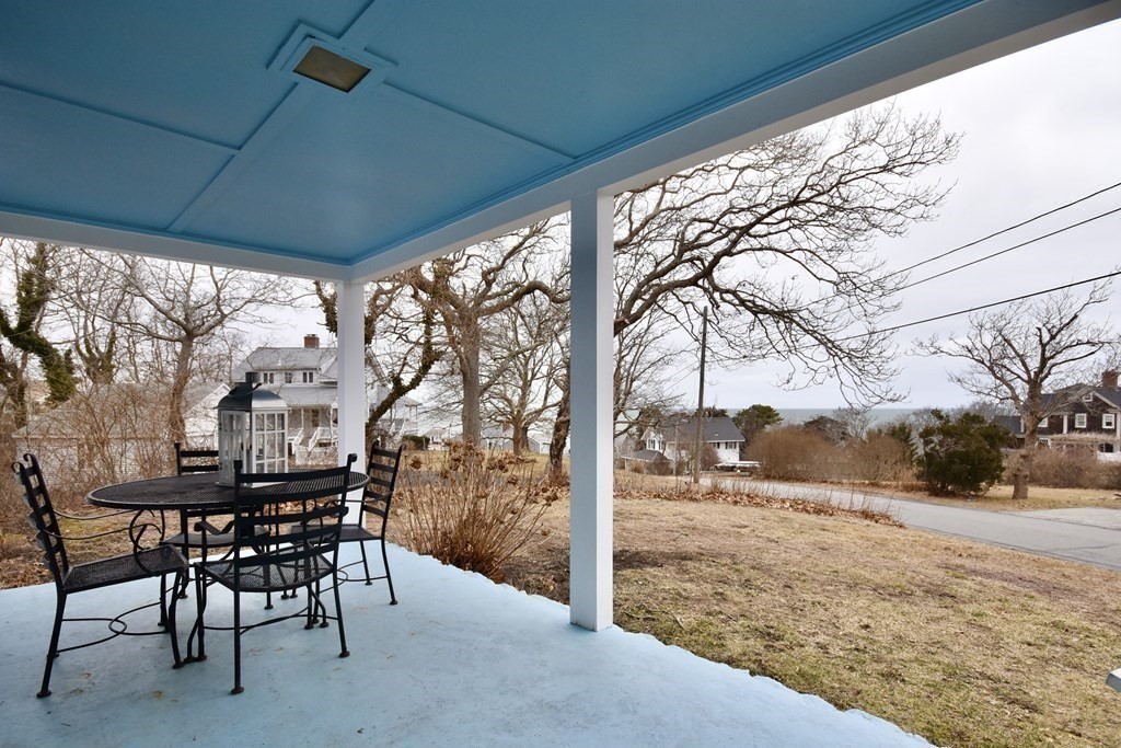 460 Williston Road Bourne, MA 02562 - Photo 31 of 37 a view of a patio with a yard
