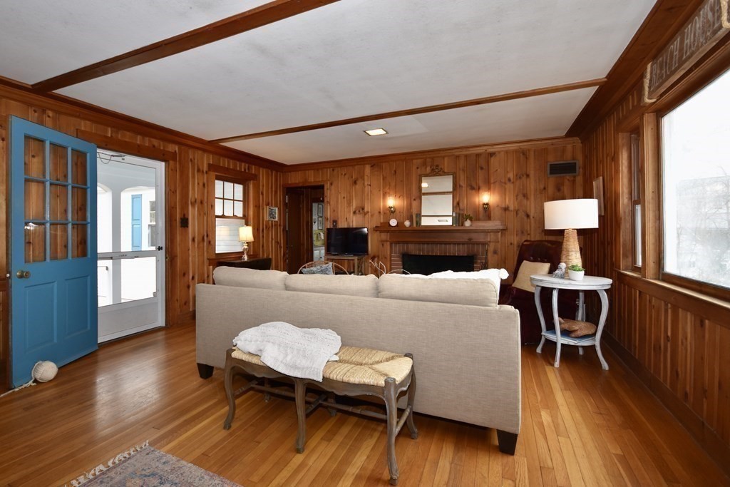 460 Williston Road Bourne, MA 02562 - Photo 10 of 37 a living room with furniture and a wooden floor