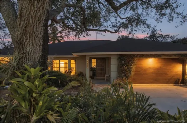 a view of swimming pool from a yard