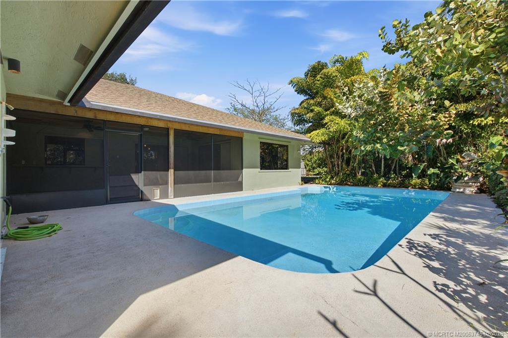5186 Southeast Harrold Terrace Stuart, FL 34997 - Photo 38 of 50 a view of a backyard