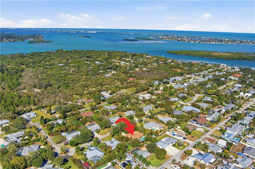 5186 Southeast Harrold Terrace Stuart, FL 34997 - Photo 6 of 50 a view of a field with an ocean