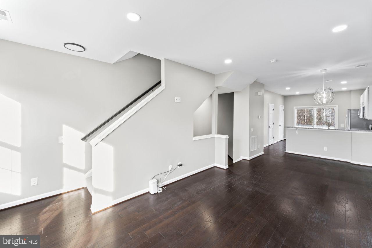 17045 Gibson Road Dumfries, VA 22026 - Photo 11 of 32 Bright and airy open-concept living space.