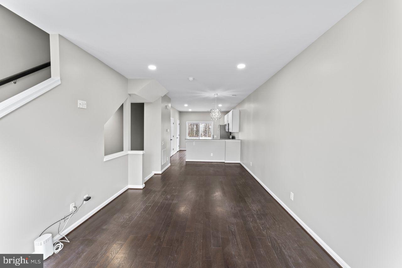 17045 Gibson Road Dumfries, VA 22026 - Photo 12 of 32 Spacious, modern interior with sleek design.