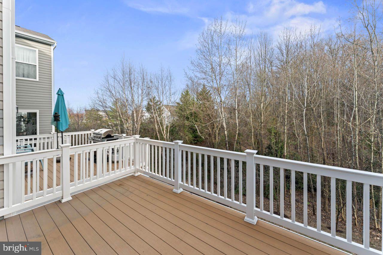 17045 Gibson Road Dumfries, VA 22026 - Photo 20 of 32 Serene deck overlooking tranquil woods.