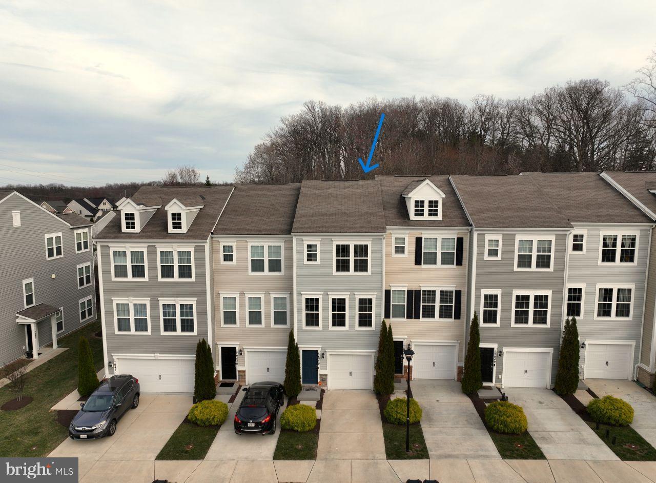 17045 Gibson Road Dumfries, VA 22026 - Photo 2 of 32 Charming townhomes nestled by serene woods.
